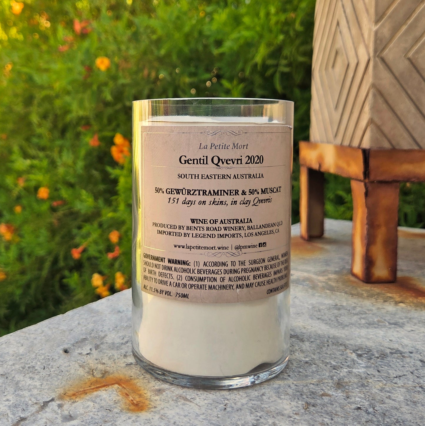 Back label of La Petite Mort Gentil Qvevri 2020 wine bottle candle, repurposed into a hand-poured eco-friendly coconut soy candle with wooden wick.