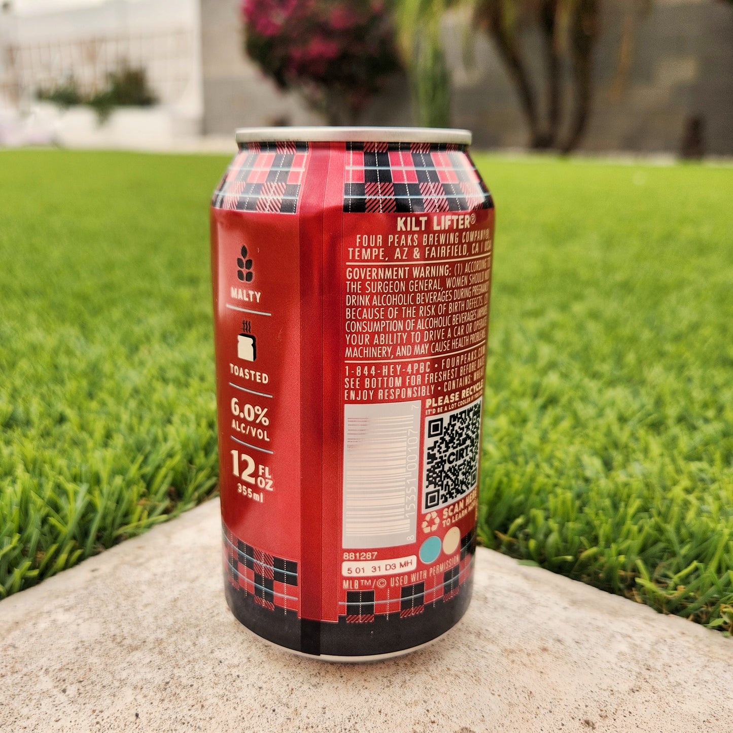 Back label of Arizona Diamondbacks edition Four Peaks Kilt Lifter beer can candle, highlighting recycled vessel details and malty flavor profile.