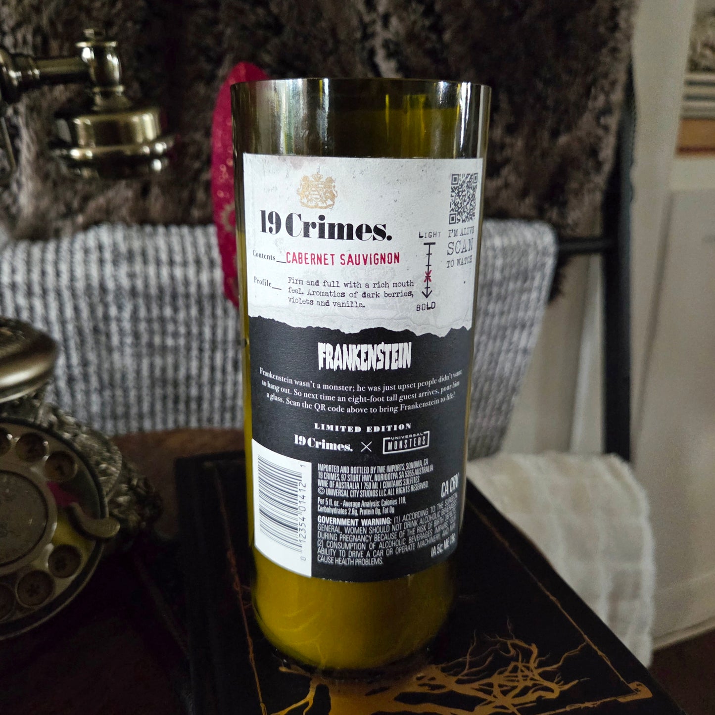 Back label of the 19 Crimes Frankenstein wine bottle candle, repurposed into an eco-friendly coconut soy candle with a wooden wick and clean-burning wax.