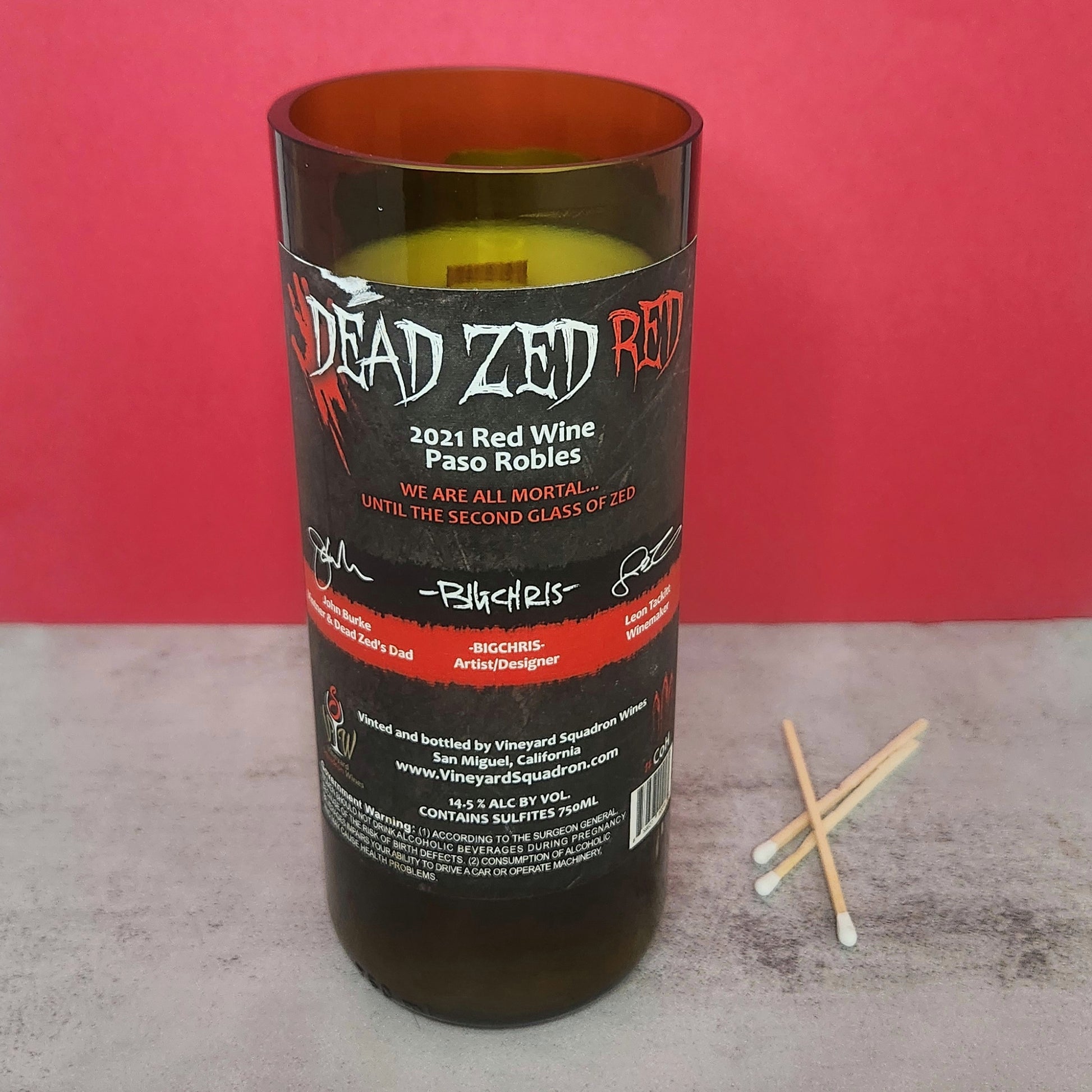 Back view of the Dead Zed Red wine bottle candle, showing the details of the label and the handcrafted nature of this unique, Phoenix-made, eco-friendly candle.