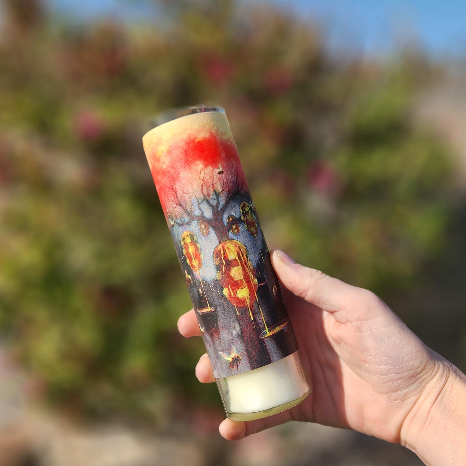 Celebrate sustainability with this hand-poured candle crafted in a recycled mead bottle. Featuring glowing beehives against a vibrant sunset forest, it beautifully highlights the charm of bees and their natural artistry.