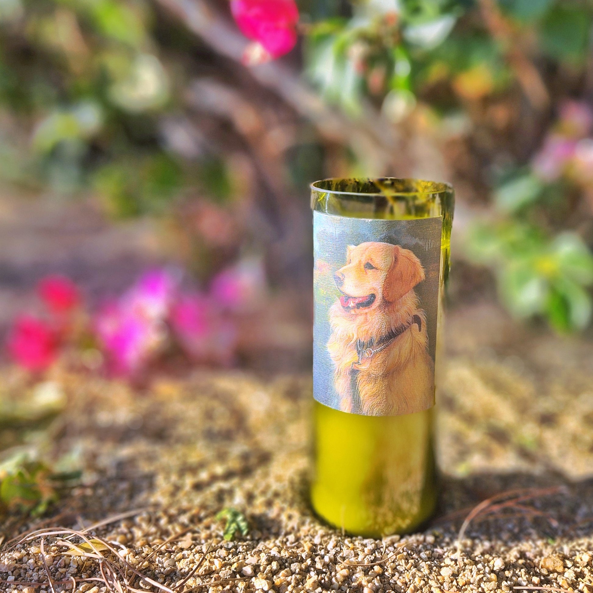 This charming candle celebrates the joy of our furry friends, featuring a delightful Golden Retriever portrait on a recycled wine bottle. A heartwarming addition to any dog lover's home!