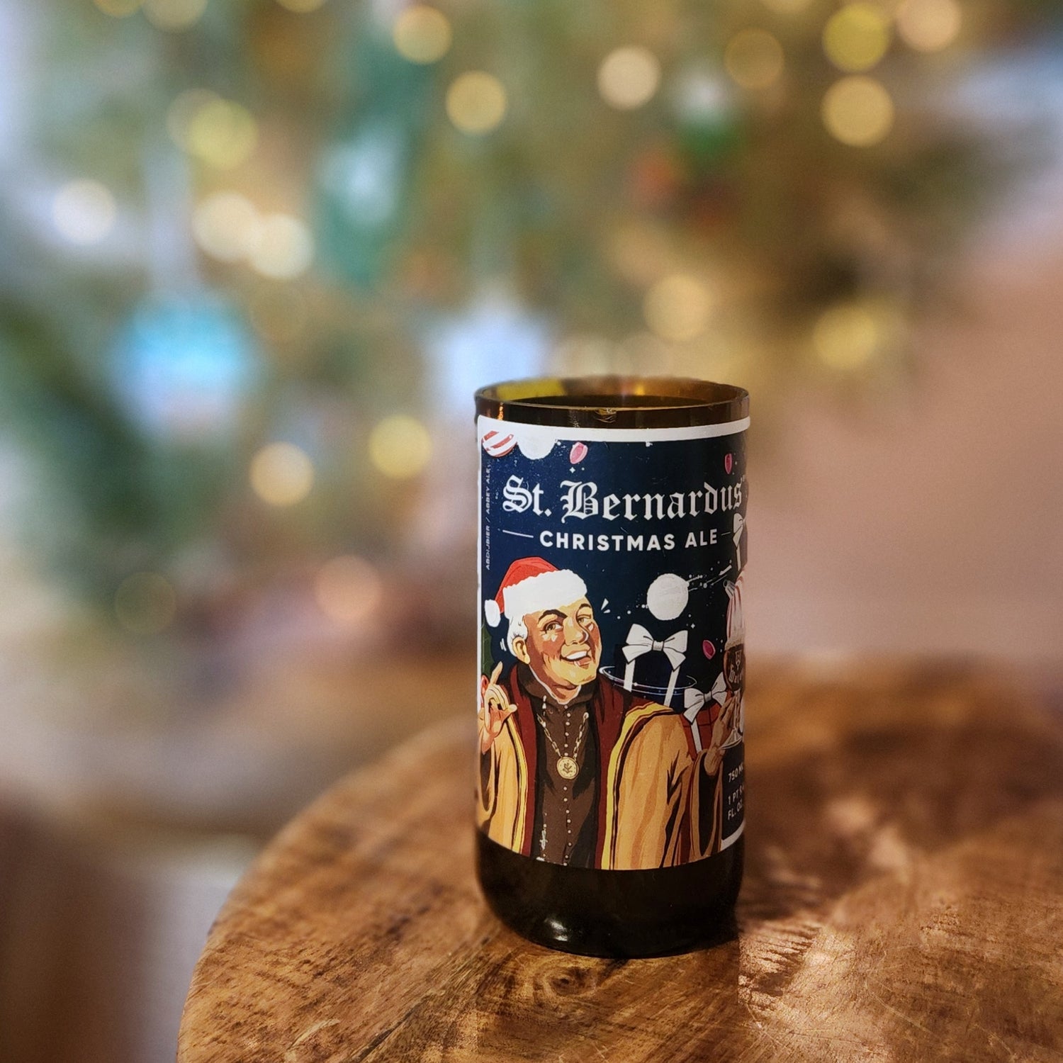 This cozy candle, crafted in a recycled St. Bernardus Christmas Ale bottle, adds holiday cheer with its festive design and warm seasonal glow