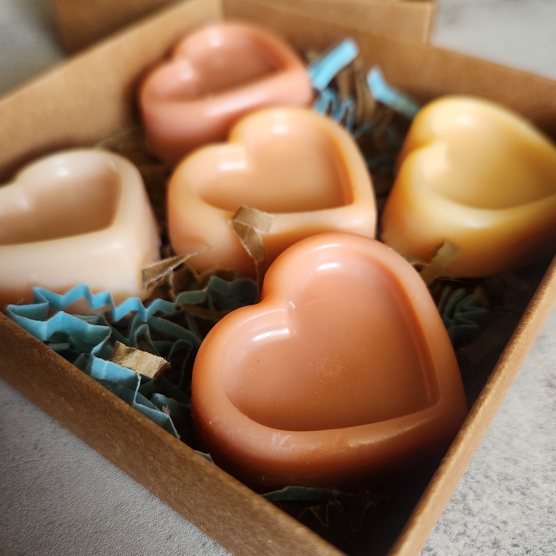 Detailed view of Sonoran Rain wax melts in a box, highlighting the earthy tones and Arizona-inspired scent.