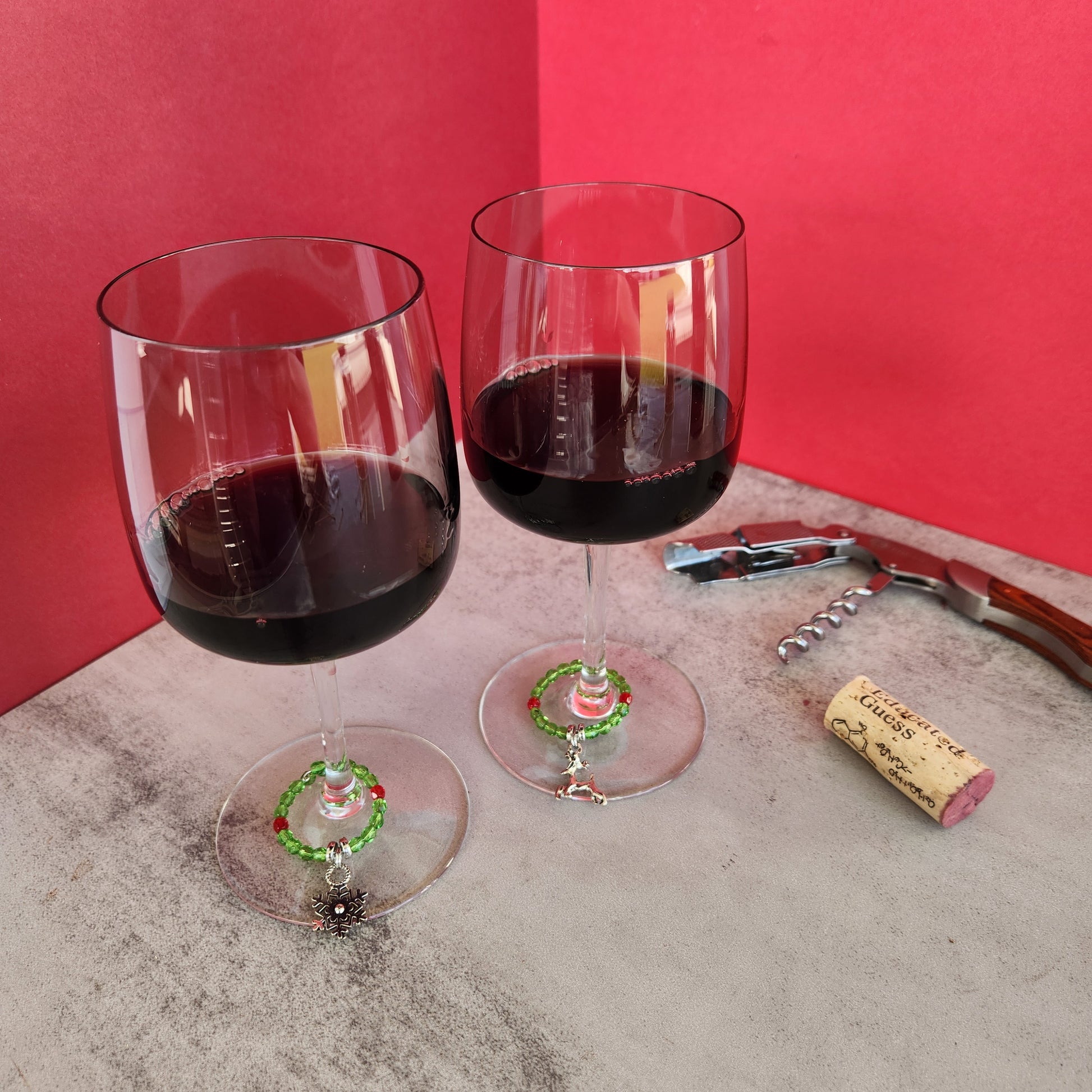 Pair of Wine Glasses with Christmas Wine Charms Featuring Red and Green Beads, Perfect for Holiday Parties