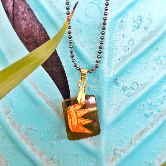 Amber recycled wine bottle glass necklace with gold crown design and handcrafted pendant