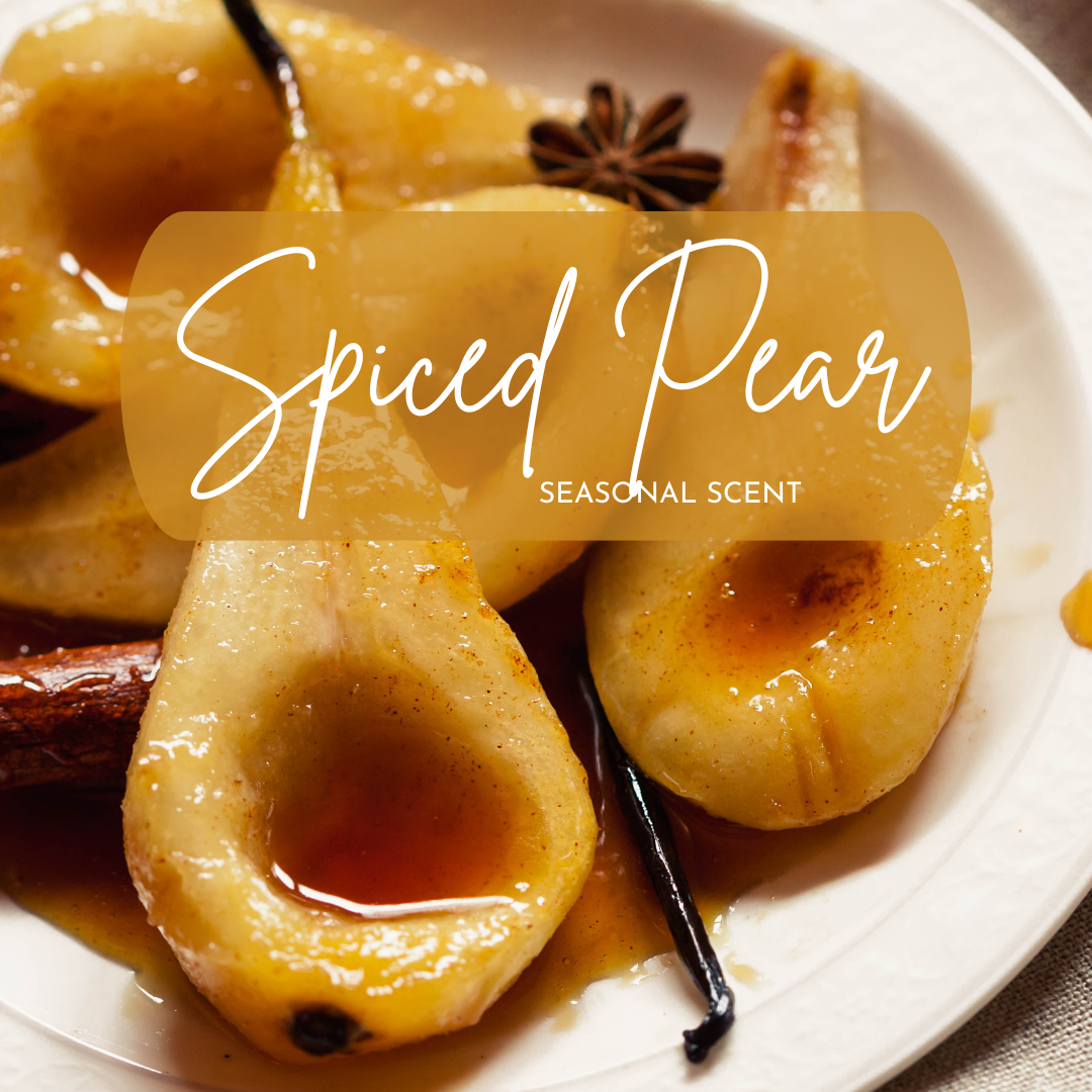 Spiced pears on a plate with star anise and vanilla bean, labeled 'Spiced Pear Seasonal Scent'.
