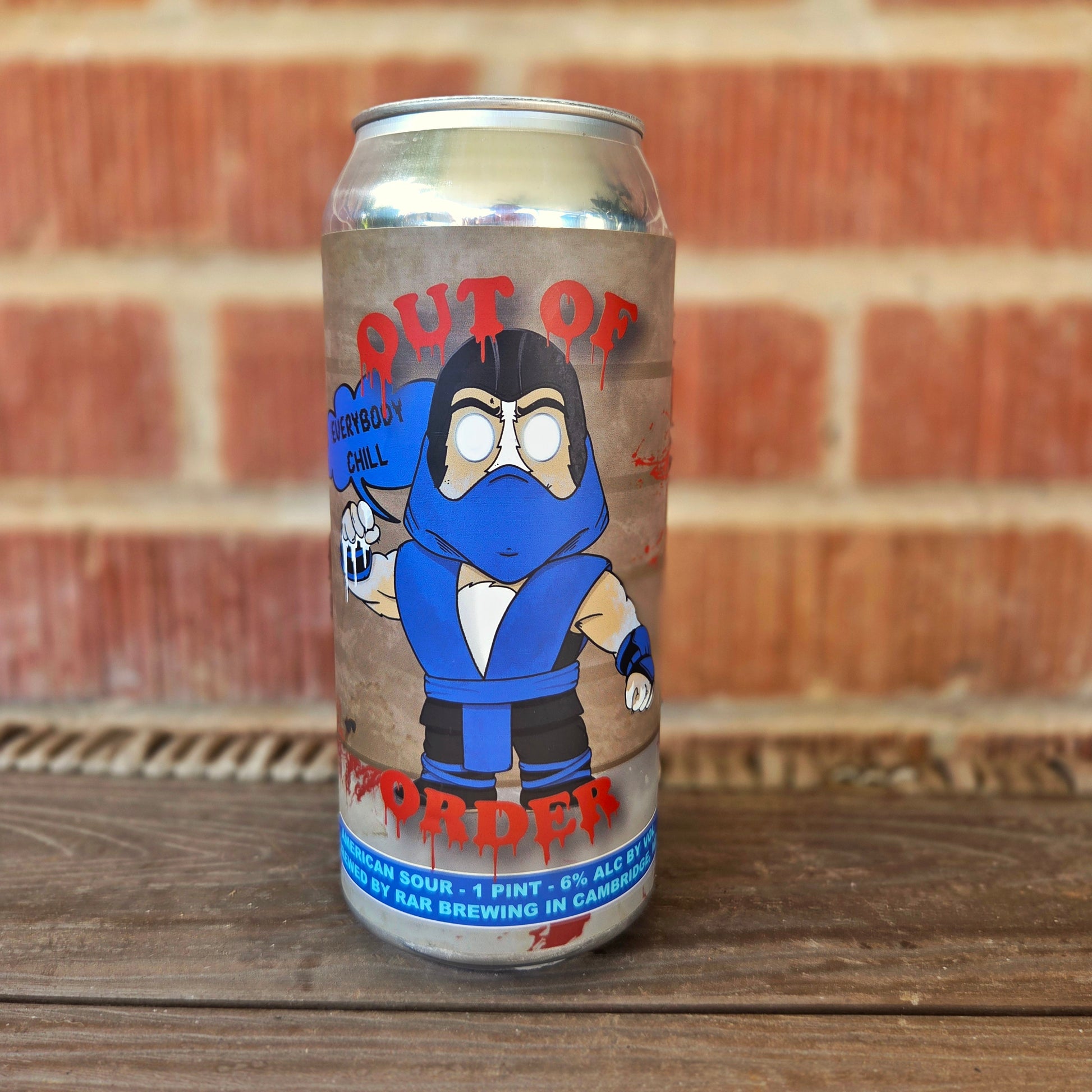 Upcycled beer can candle featuring a Mortal Kombat-inspired Sub-Zero cartoon dog design with a blue ninja outfit, icy white eyes, and the phrase “Everybody Chill.” Hand-poured with coconut soy wax and a wooden wick, combining bold pop culture art with eco-friendly craftsmanship.

