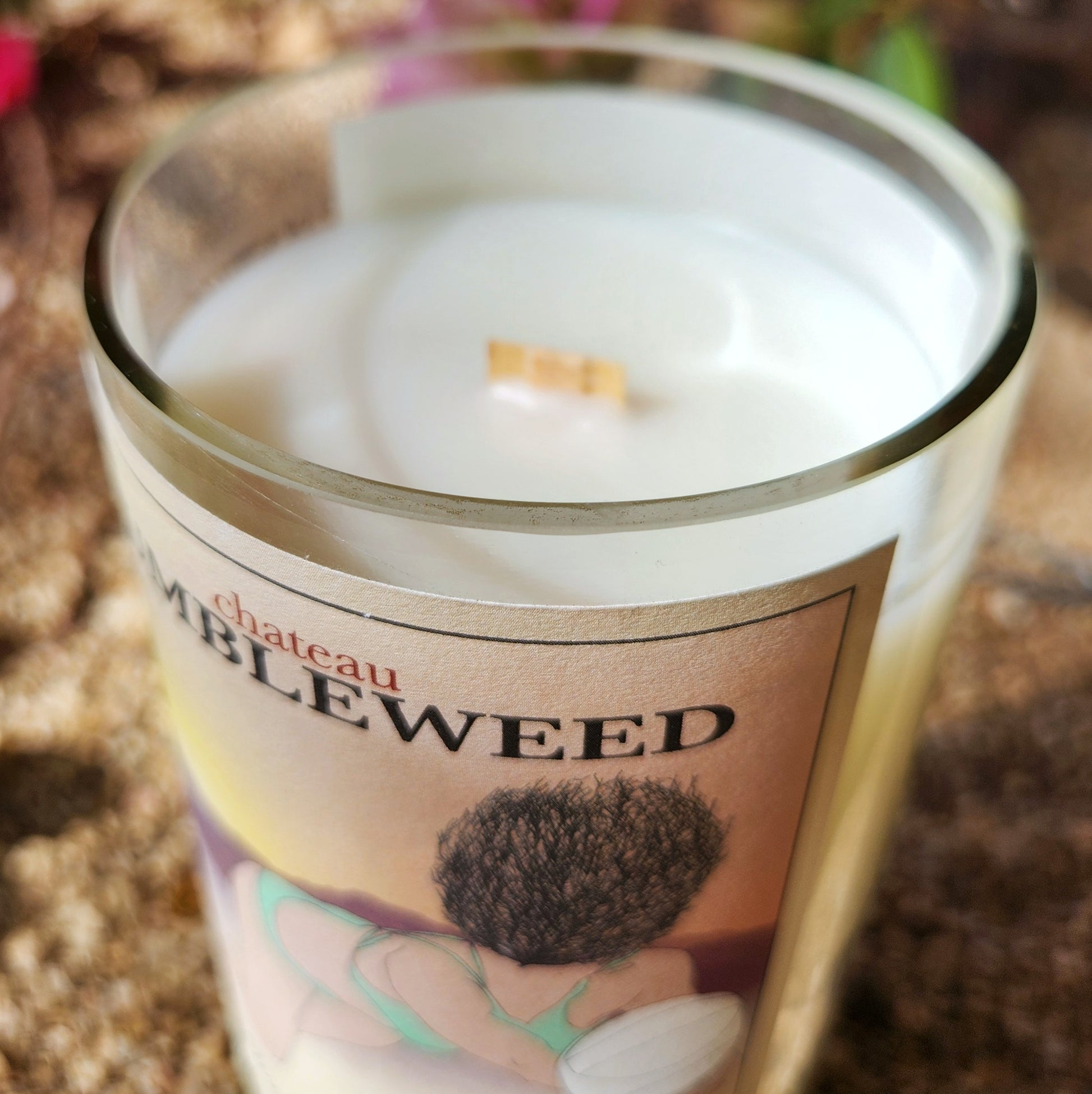 Close-up of the rim of an eco-friendly wine bottle candle with a clean-cut, glossy edge, highlighting the smooth coconut soy wax and wooden wick inside.