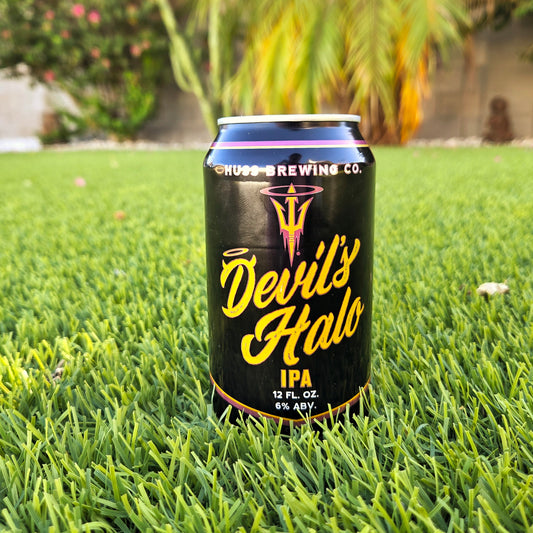 Handmade ASU Sun Devils beer can candle in a recycled black Arizona brewery can featuring the maroon and gold pitchfork logo.