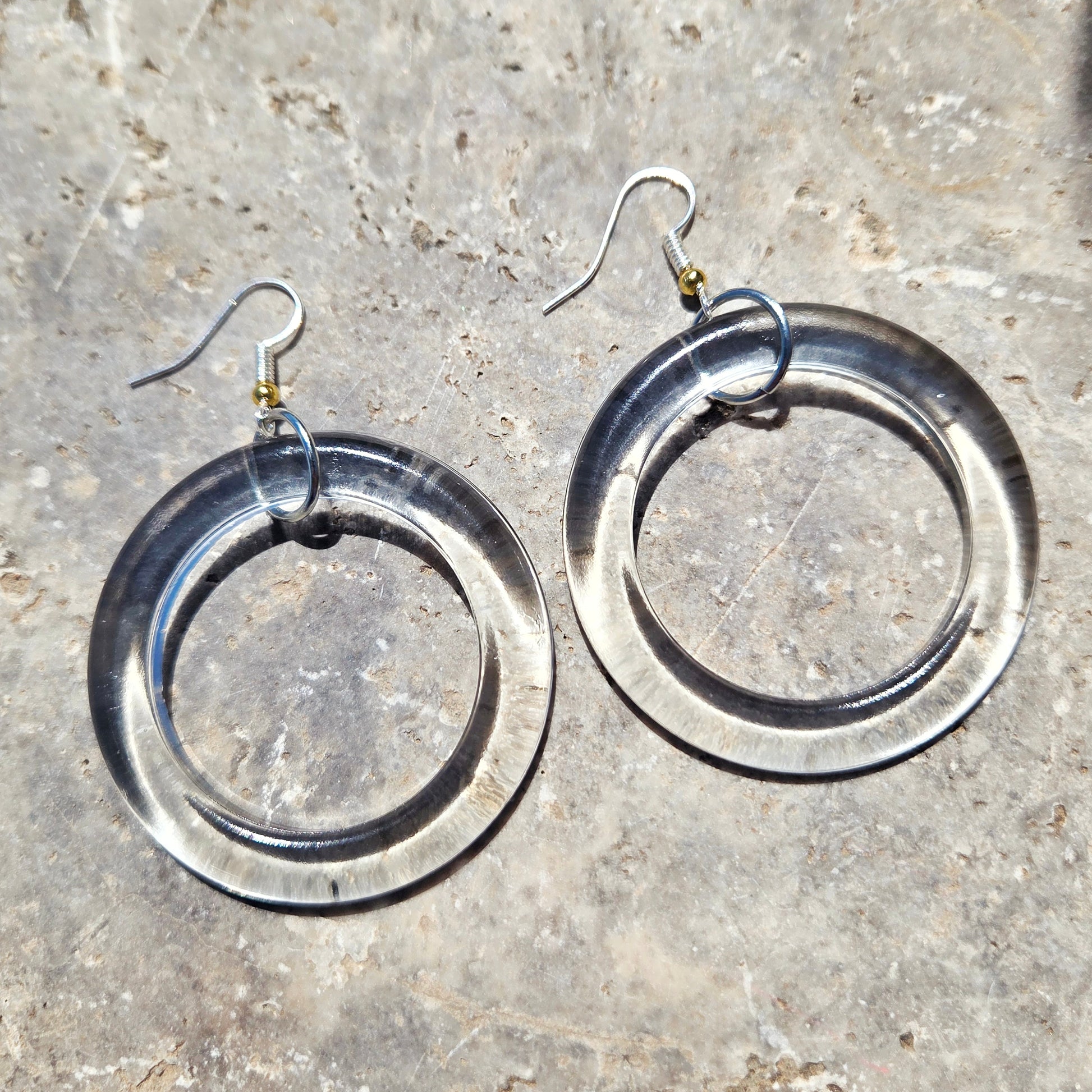 Oversized clear upcycled bottle glass hoop earrings with silver-tone earwires and gold-tone bead accents