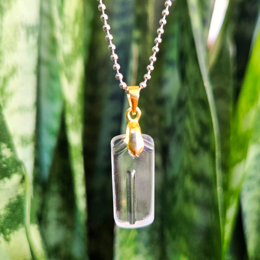Letter I initial necklace made from clear recycled liquor bottle glass with original raised lettering