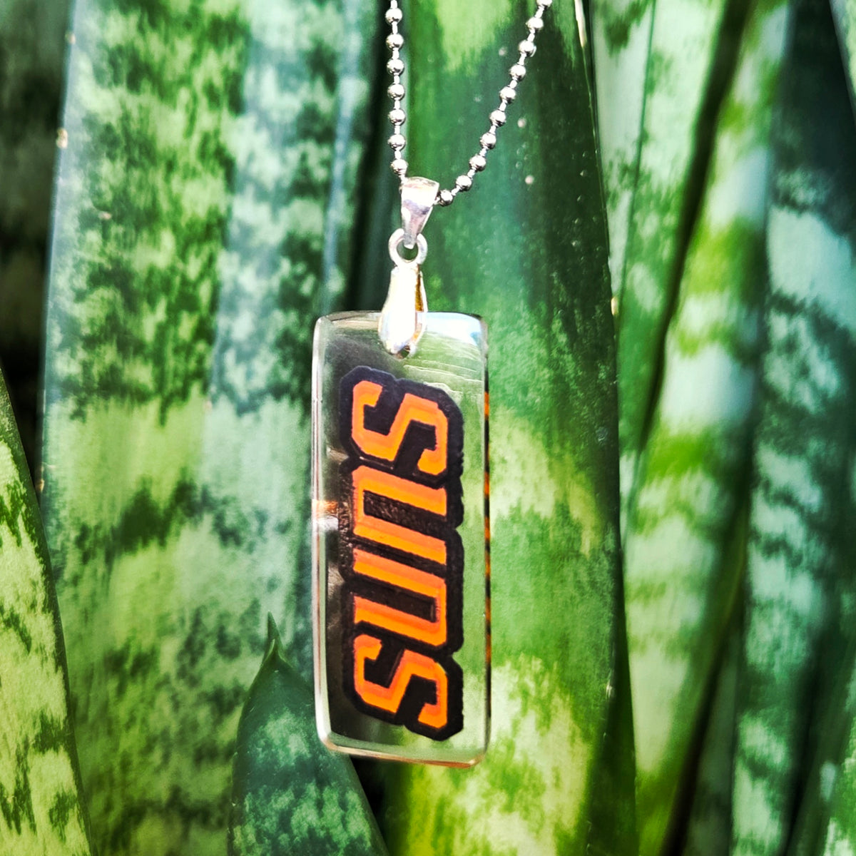 Phoenix Suns basketball necklace made from recycled Danzeisen Dairy milk bottle glass with original Suns artwork