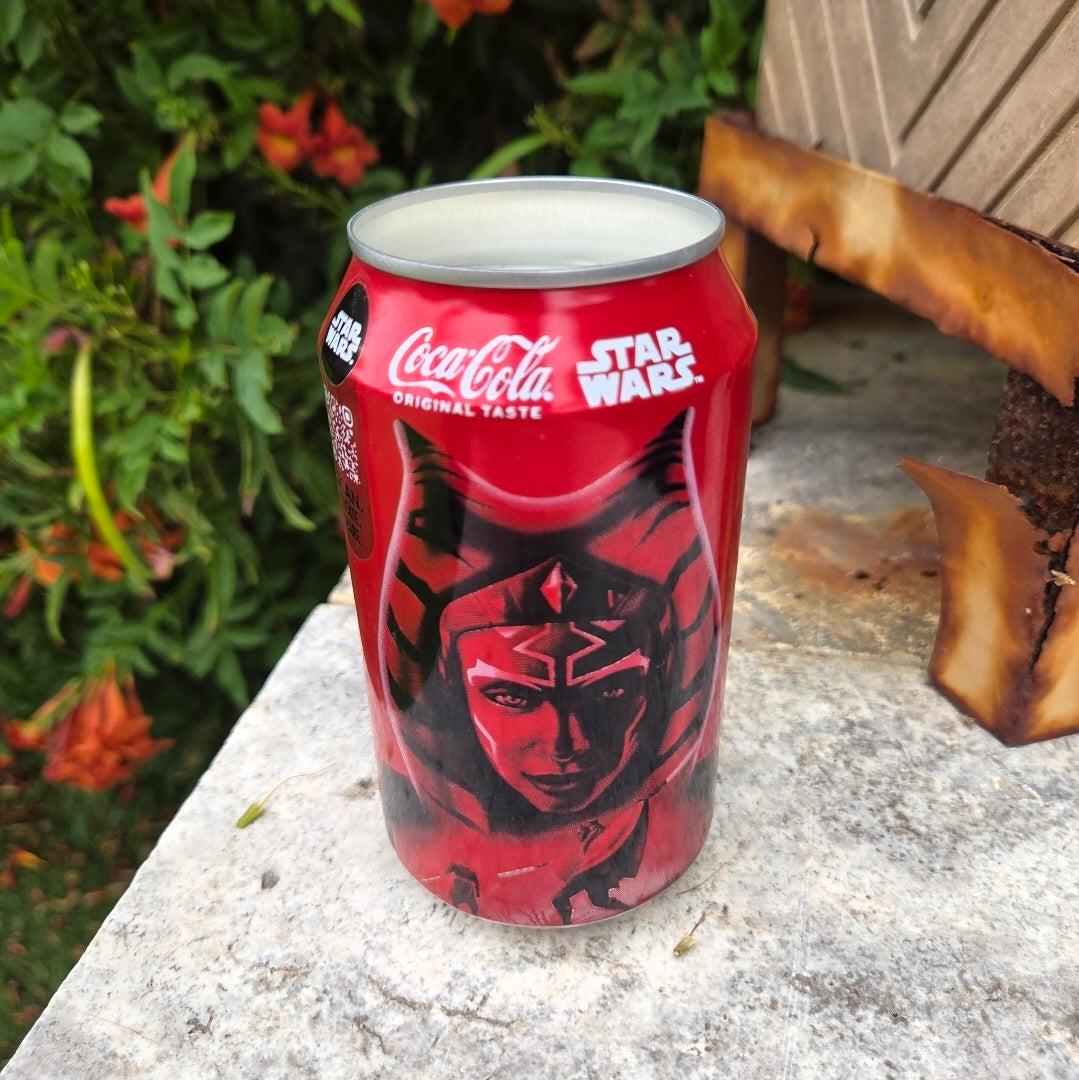 Handmade recycled Coke can candle featuring a red sci-fi character design, filled with coconut soy wax and Private Reserve fragrance.