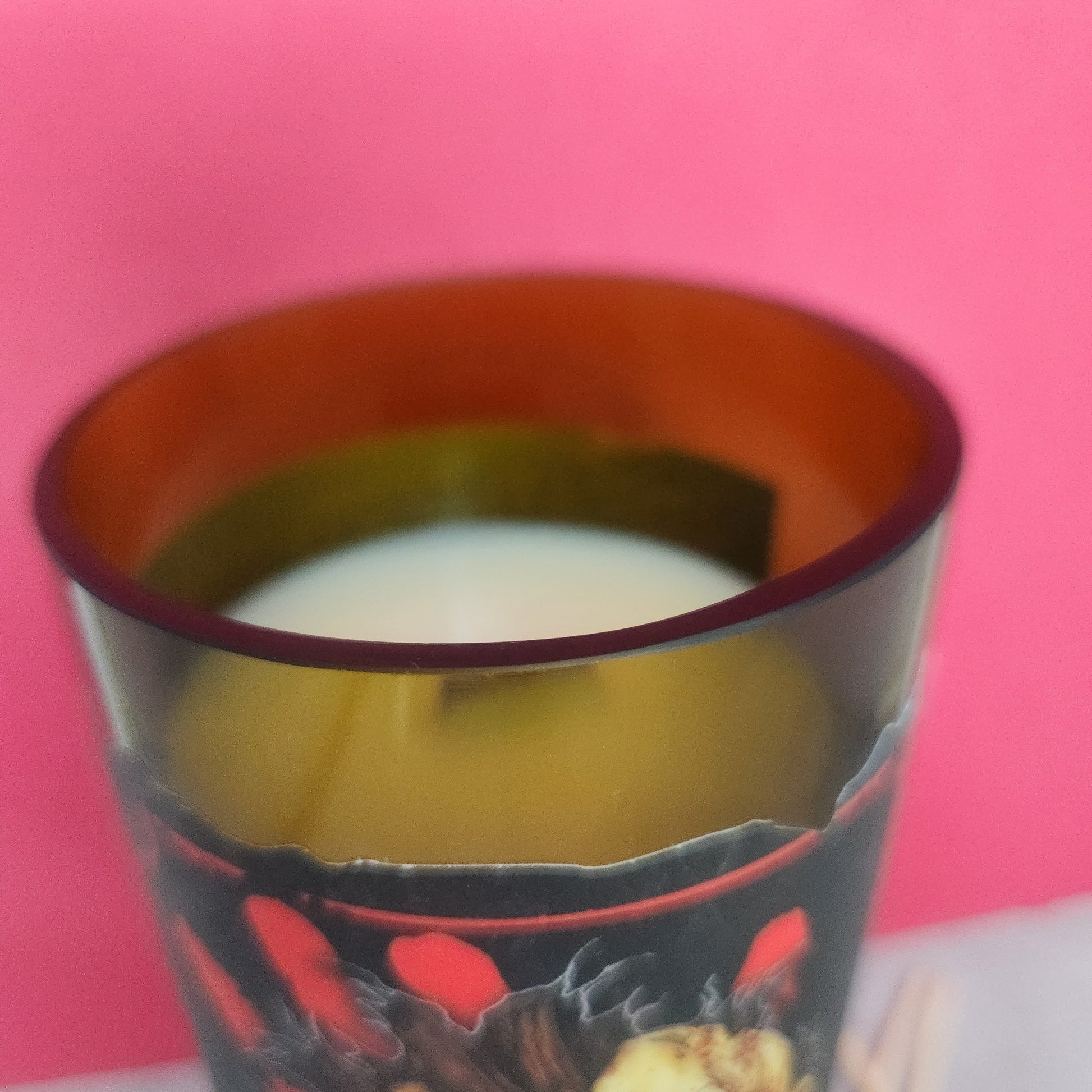 Top edge view of a white candle with a wooden wick inside a recycled wine bottle, showcasing the sustainable and hand-poured craftsmanship of Cactus+Vine candles from Phoenix, AZ, with an Autumn Campfire scent