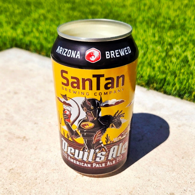 Handmade Sun Devil beer can candle in a recycled Arizona brewery can with gold and black desert artwork, coconut soy wax and wooden wick.